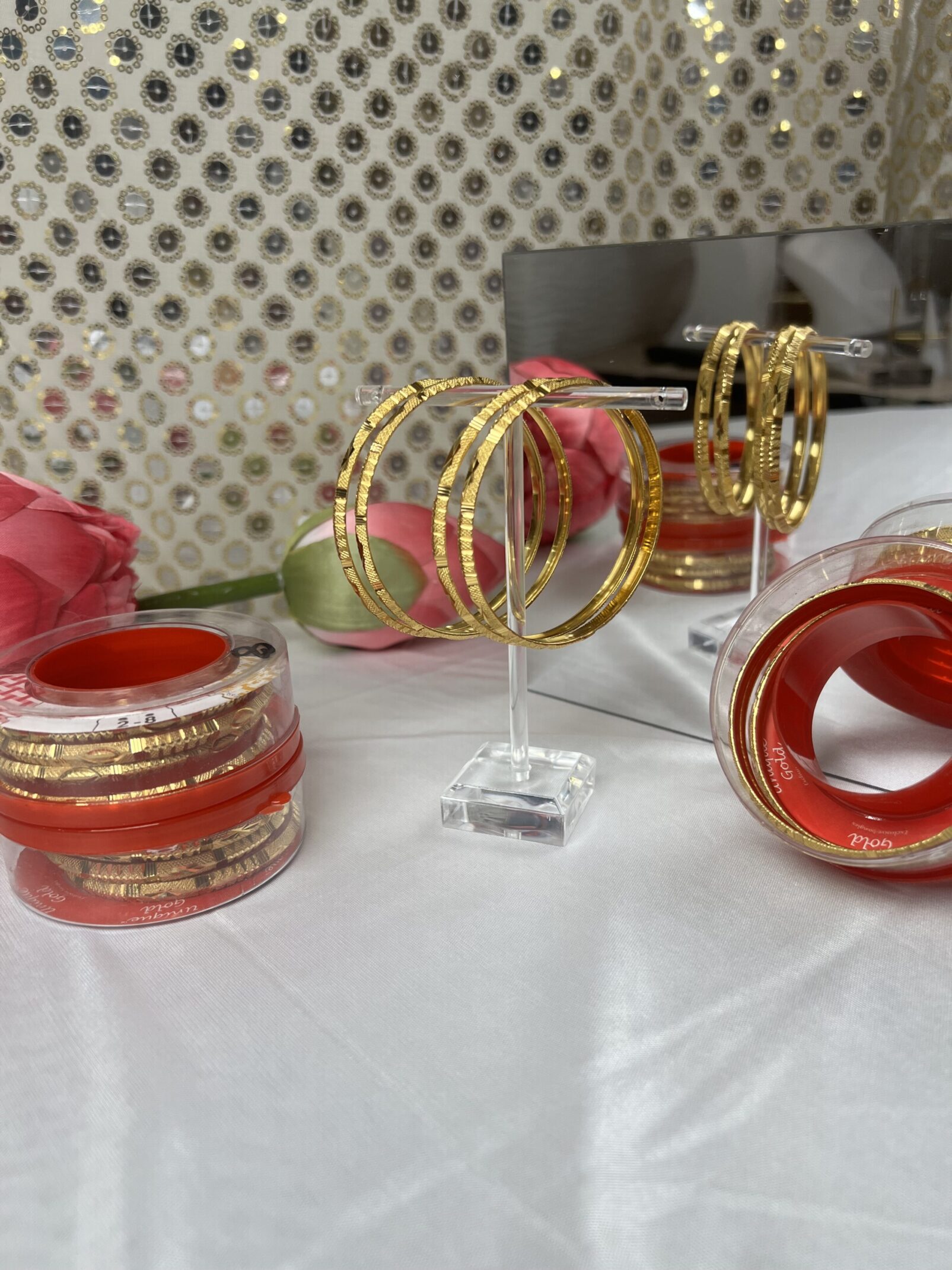 A table with several different types of bangles.