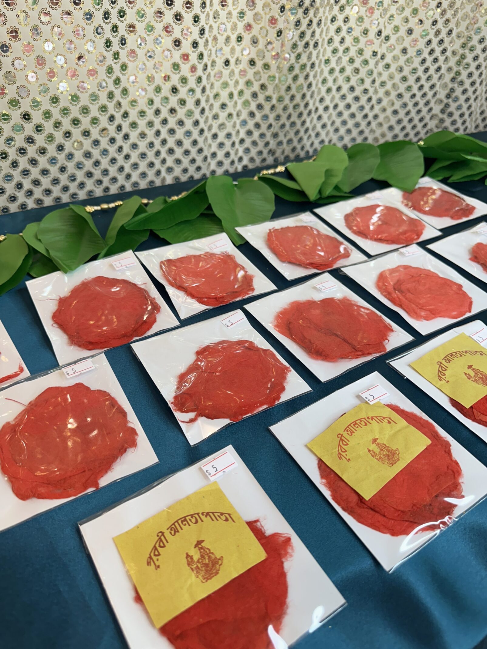 A table with many red and yellow paper plates