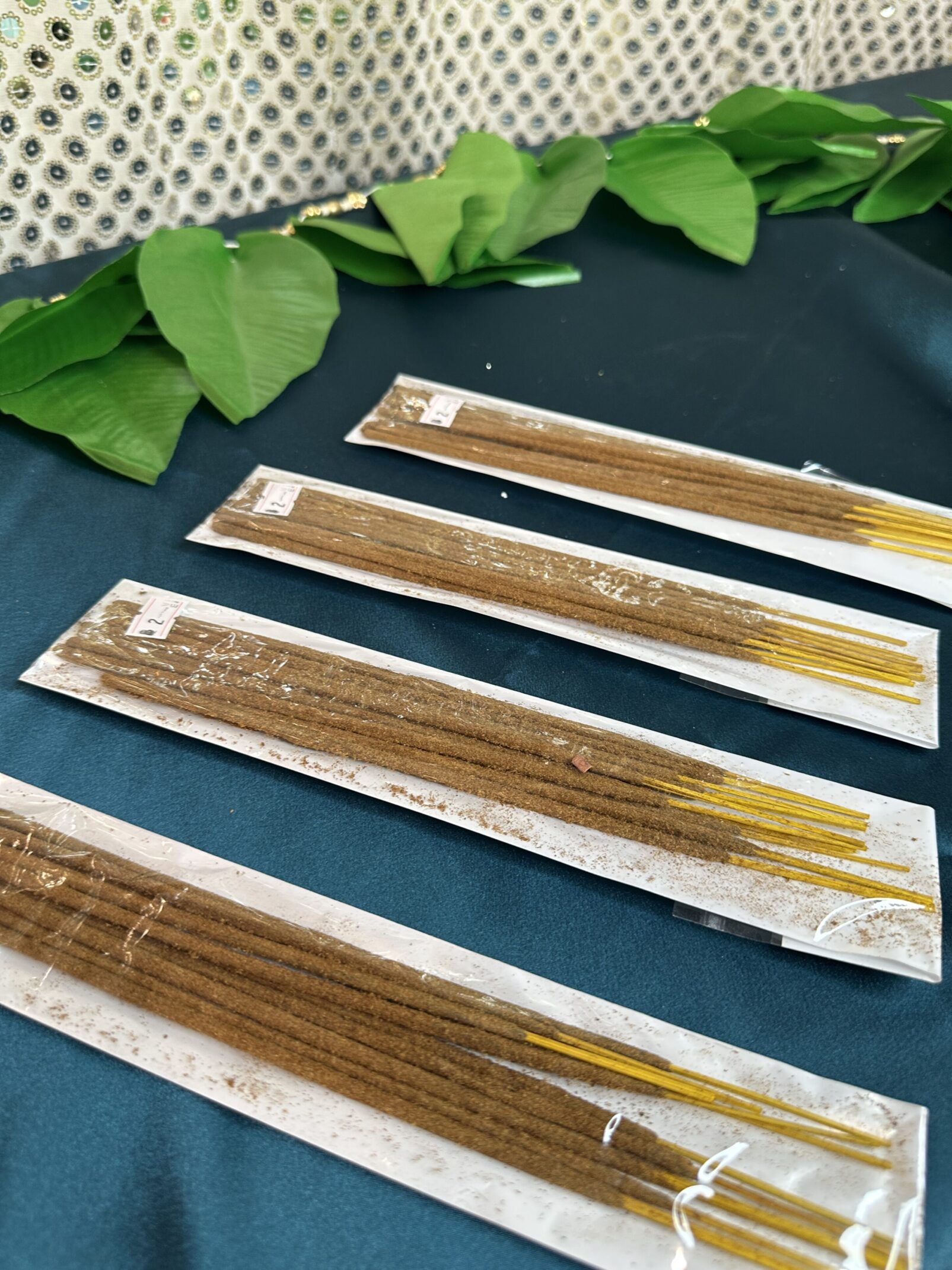 A close up of some sticks of incense