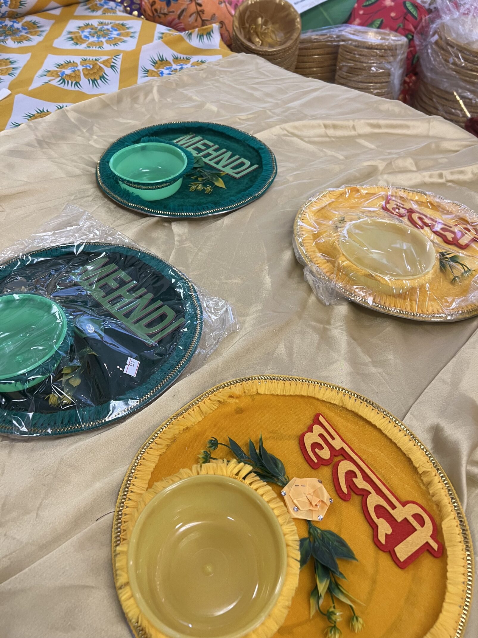 A table with several plates and bowls on it.