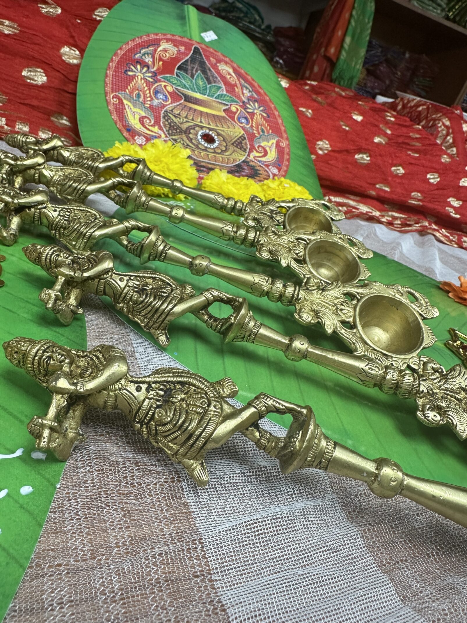A group of brass objects sitting on top of a table.