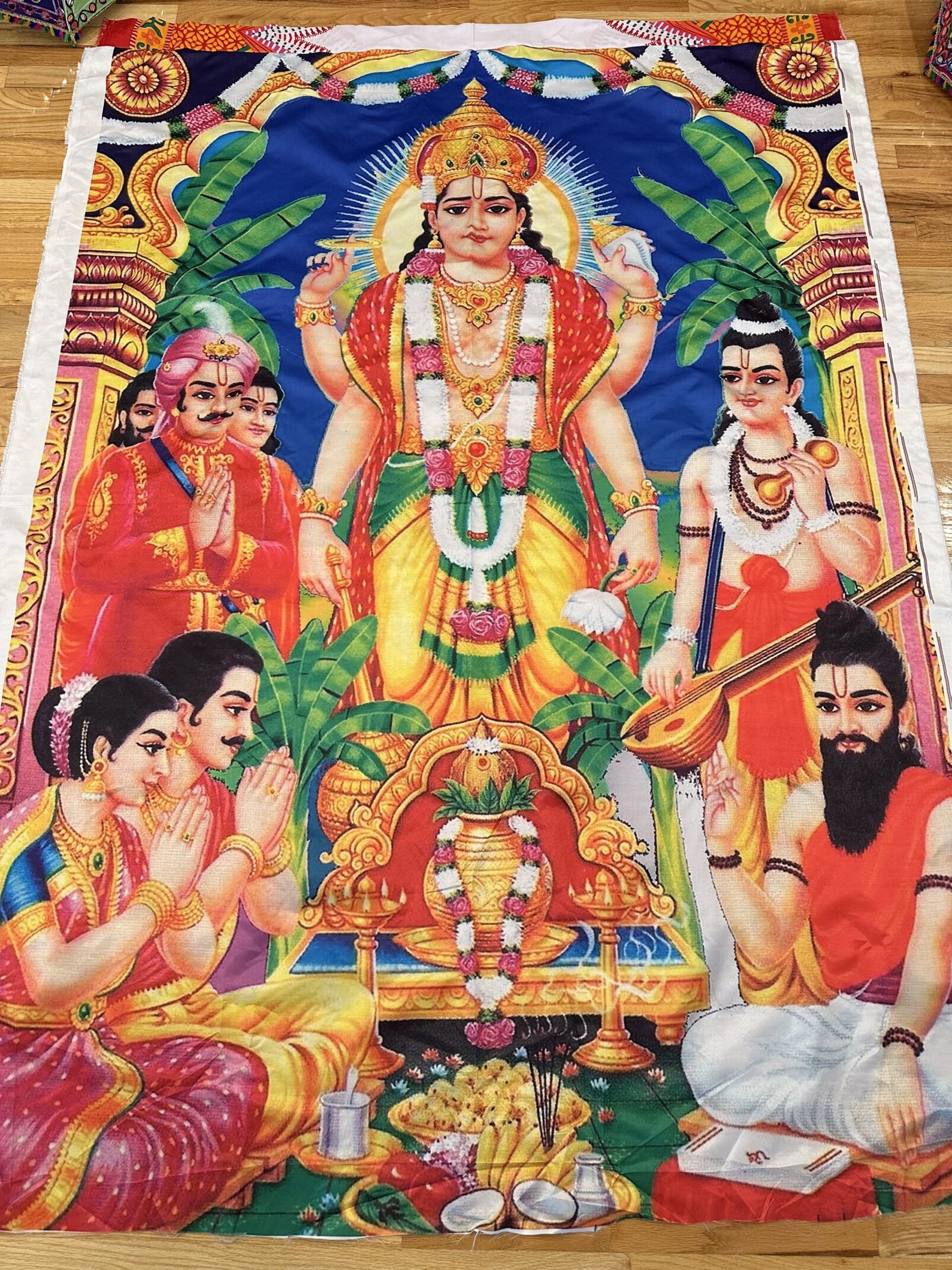 A painting of the goddess kali with other people.